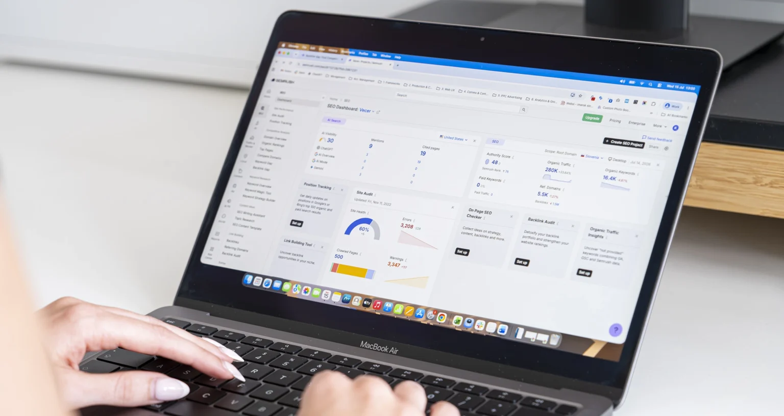 Website analysis using an SEO tool on a laptop.